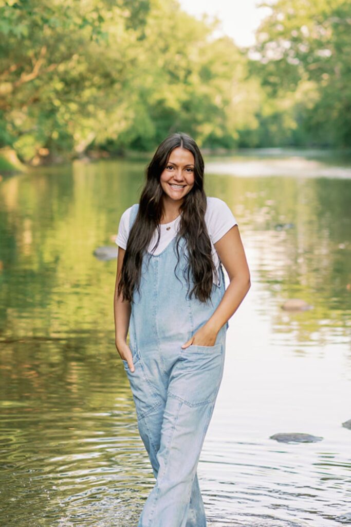 Woman standing in river