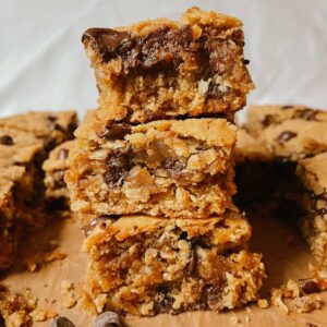 Stack of sourdough peanut butter oatmeal chocolate chip cookie bar squares