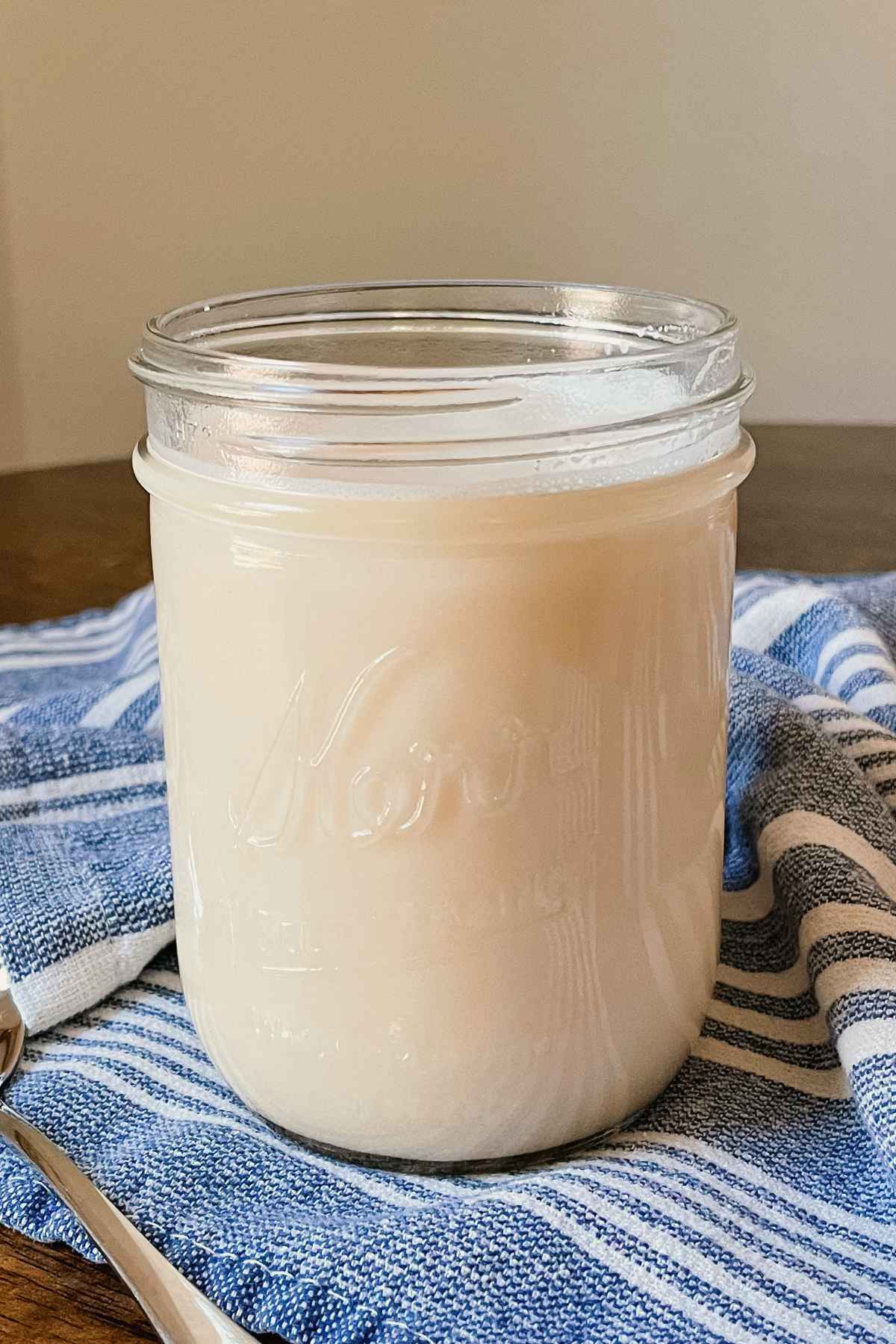 Crème brûlée coffee syrup in a glass jar