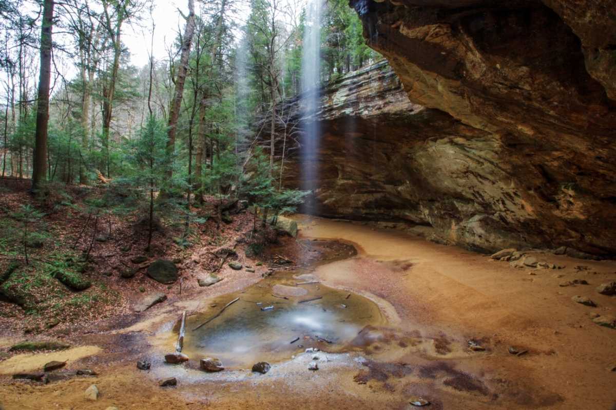 Waterfall flowing at Ash Cave in Hocking Hills