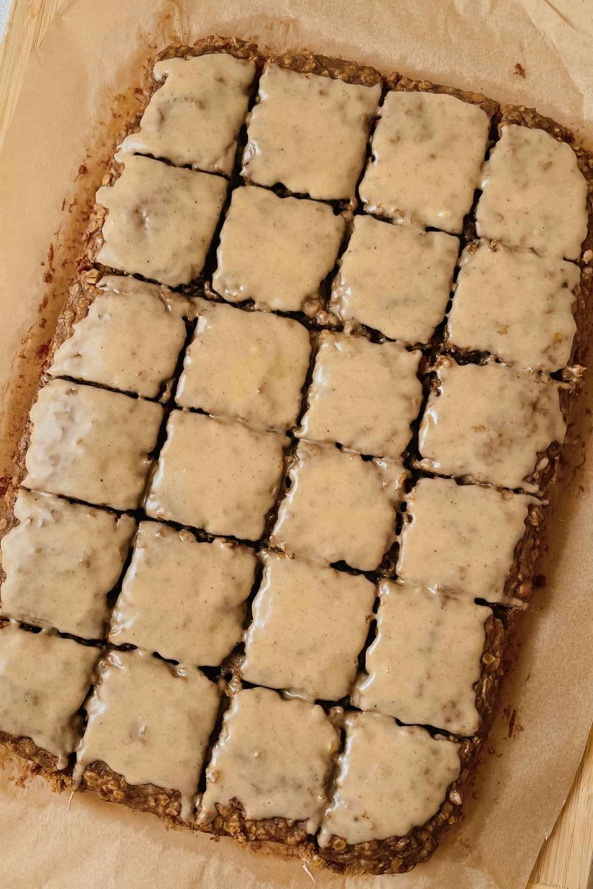Sourdough pumpkin oatmeal cookie bar squares with maple icing